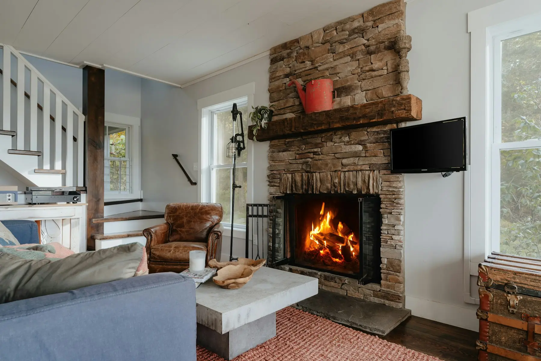Stone fireplace in a remodeled family room